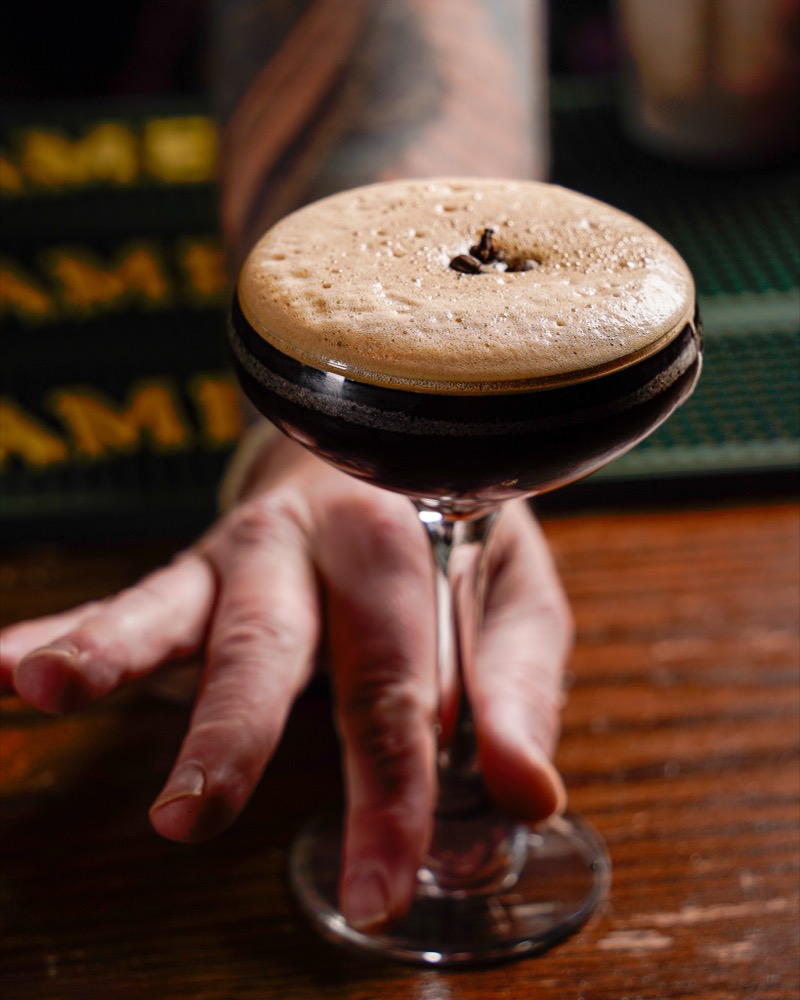 A cocktail on a bar representing digital discovery for restaurants